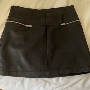Black leather mini skirt